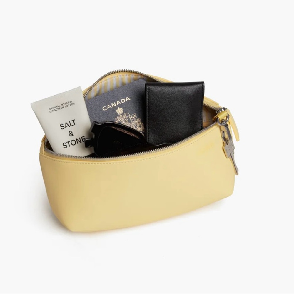 Brand new limited edition Monos Metro Sling in Banana Pudding yellow.